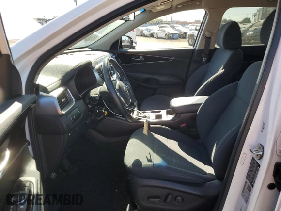 2019 Kia Sorento S with VIN 5XYPG4A51KG601460, listed as a Copart auction lot 80128124 with 34,719 mi miles and Salvage Title. Bid and sale history available at DreamBid. Image 7.