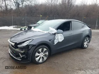 2022 Tesla Model Y Long Range z VIN 7SAYGDEE9NF331410, wystawiony jako IAAI lot #41580172 z przebiegiem 81 794 mil mil oraz . Historia ofert i sprzedaży dostępna na DreamBid. Obrazek 19.
