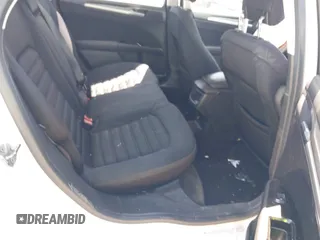 2013 Ford Fusion SE Hybrid z VIN 3FA6P0LU9DR349321, wystawiony jako IAAI lot #42156321 z przebiegiem 90 688 mil mil oraz . Historia ofert i sprzedaży dostępna na DreamBid. Obrazek 8.