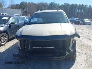 2014 Chevrolet Tahoe LTZ z VIN 1GNSCCE00ER228911, wystawiony jako IAAI lot #41732239 z przebiegiem 216 743 mil mil oraz . Historia ofert i sprzedaży dostępna na DreamBid. Obrazek 13.