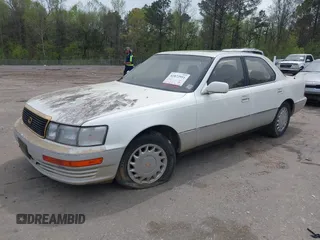 1991 Lexus LS z VIN JT8UF11E6M0075970, wystawiony jako IAAI lot #41872951 z przebiegiem 217 251 mil mil oraz . Historia ofert i sprzedaży dostępna na DreamBid. Obrazek 2.