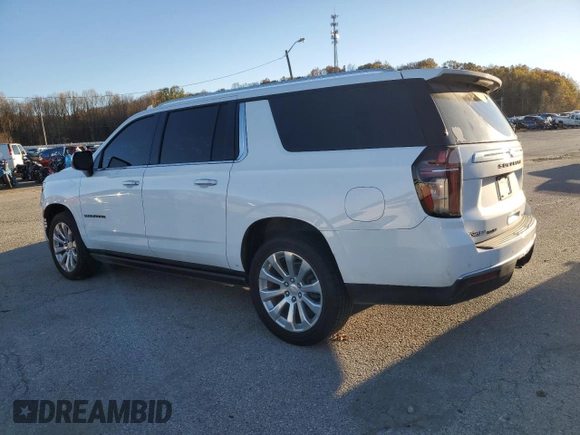 2022 Chevrolet Suburban Premier with VIN 1GNSKFKT7NR242288, listed as a Copart auction lot 79420734 with 77,006 mi miles and Salvage Title. Bid and sale history available at DreamBid. Image 2.