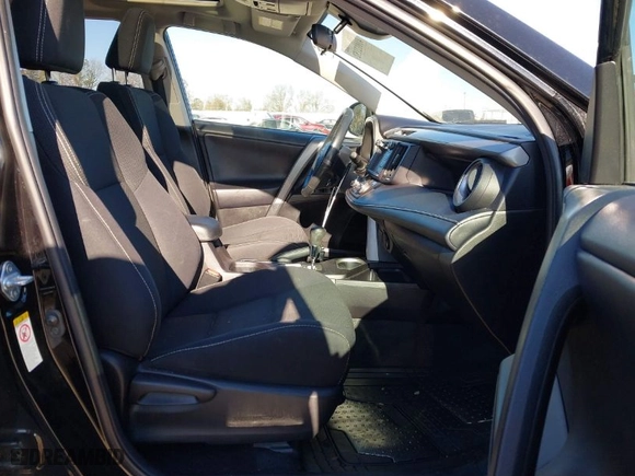 2018 Toyota RAV4 XLE with VIN 2T3RFREV9JW793956, listed as a IAAI auction lot 41012152 with 77,033 mi miles. Bid and sale history available at carsss.com. Image 5.