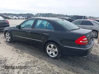 2004 Mercedes-Benz E-Class 5.0L with VIN WDBUF70J64A489519, listed as a IAAI auction lot 41675167 with 226,361 mi miles. Bid and sale history available at carsss.com. Image 3.