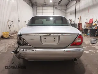 2004 Jaguar XJ with VIN SAJWA71C04SG33993, listed as a IAAI auction lot 41193040 with 79,944 mi miles. Bid and sale history available at carsss.com. Image 16.