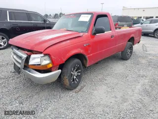 2000 Ford Ranger XL with VIN 1FTYR10C7YTA56021, listed as a IAAI auction lot 41545907 with 319,850 mi miles. Bid and sale history available at carsss.com. Image 2.