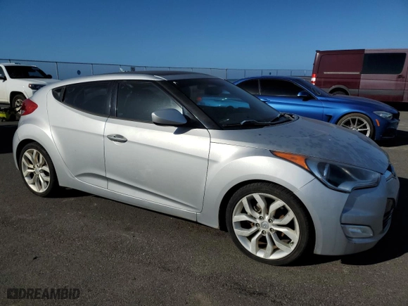 2012 Hyundai Veloster w/Gray Int with VIN KMHTC6AD7CU052825, listed as a Copart auction lot 46370515 with 113,209 mi miles and Non Repairable. Bid and sale history available at carsss.com. Image 4.