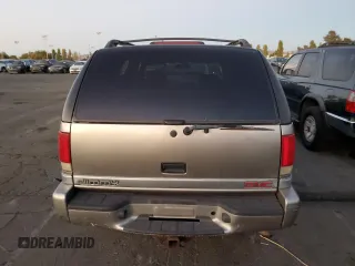 2000 GMC Jimmy SLE Convenience with VIN 1GKDT13WXY2158025, listed as a Copart auction lot 73565954 with 0 mi miles and Salvage Title. Bid and sale history available at carsss.com. Image 6.