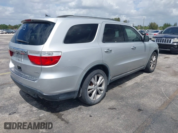 2011 Dodge Durango Crew with VIN 1D4RD4GGXBC598205, listed as a IAAI auction lot 41908965 with 182,875 mi miles and . Bid and sale history available at carsss.com. Image 4.