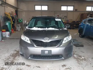 2014 Toyota Sienna LE with VIN 5TDJK3DC9ES071870, listed as a IAAI auction lot 41133491 with 82,134 mi miles. Bid and sale history available at carsss.com. Image 12.