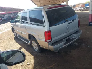 2005 Cadillac Escalade z VIN 1GYEC63T65R164307, wystawiony jako IAAI lot #42015617 z przebiegiem 173 270 mil mil oraz . Historia ofert i sprzedaży dostępna na DreamBid. Obrazek 3.