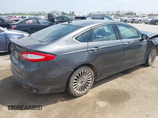 2016 Ford Fusion Titanium with VIN 3FA6P0K97GR217062, listed as a IAAI auction lot 42044943 with Not Provided miles and . Bid and sale history available at carsss.com. Image 4.