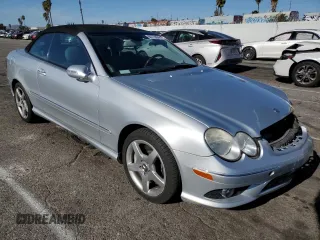 2007 Mercedes-Benz CLK 550 with VIN WDBTK72F27T076330, listed as a Copart auction lot 80770694 with 126,018 mi miles and Salvage Title. Bid and sale history available at DreamBid. Image 4.