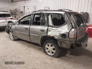 2005 GMC Envoy SLT with VIN 1GKDT13S352257892, listed as a IAAI auction lot 41690880 with 134,216 mi miles. Bid and sale history available at carsss.com. Image 3.