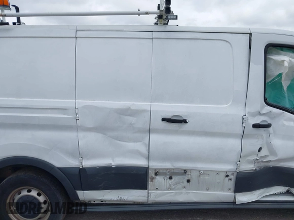 2016 Ford Transit Cargo z VIN 1FTYR1ZM5GKA09697, wystawiony jako IAAI lot #41929098 z przebiegiem 98 790 mil mil oraz . Historia ofert i sprzedaży dostępna na DreamBid. Obrazek 12.