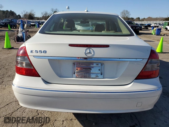 2007 Mercedes-Benz E 550 with VIN WDBUF72X37B021084, listed as a Copart auction lot 48695235 with 119,538 mi miles and Salvage Title. Bid and sale history available at DreamBid. Image 6.