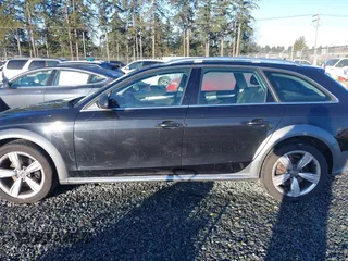 2014 Audi allroad Premium Plus with VIN WA1UFAFL1EA156213, listed as a IAAI auction lot 41610274 with 115,688 mi miles. Bid and sale history available at carsss.com. Image 14.