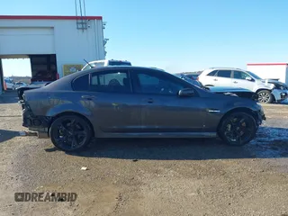 2009 Pontiac G8 GT with VIN 6G2EC57Y79L208207, listed as a IAAI auction lot 41232537 with 180,614 mi miles. Bid and sale history available at carsss.com. Image 14.