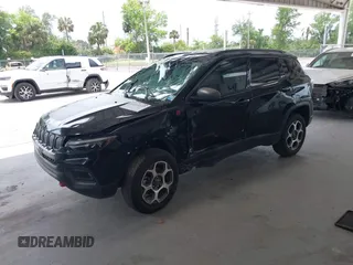 2022 Jeep Compass Trailhawk with VIN 3C4NJDDB5NT164201, listed as a IAAI auction lot 42214973 with 92,668 mi miles and . Bid and sale history available at DreamBid. Image 2.