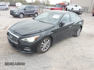 2015 Infiniti Q50 Premium z VIN JN1BV7ARXFM410177, wystawiony jako IAAI lot #41936999 z przebiegiem 129 123 mil mil oraz . Historia ofert i sprzedaży dostępna na DreamBid. Obrazek 17.