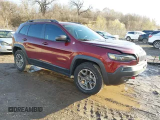 2021 Jeep Cherokee Trailhawk z VIN 1C4PJMBX5MD193290, wystawiony jako IAAI lot #40903042 z przebiegiem 54 239 mil mil oraz . Historia ofert i sprzedaży dostępna na DreamBid. Obrazek 1.