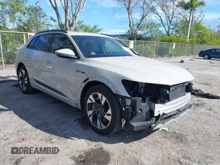 2022 Audi e-tron Premium with VIN WA1AAAGE1NB012253, listed as a IAAI auction lot 41424316 with 23,667 mi miles. Bid and sale history available at carsss.com. Image 1.