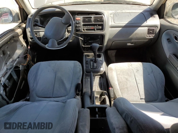 2002 Suzuki XL7 Standard z VIN JS3TY92V524108548, wystawiony jako Copart lot #56304705 z przebiegiem 288 201 mil mil oraz Nie do naprawy • Non repairable. Historia ofert i sprzedaży dostępna na DreamBid. Obrazek 8.