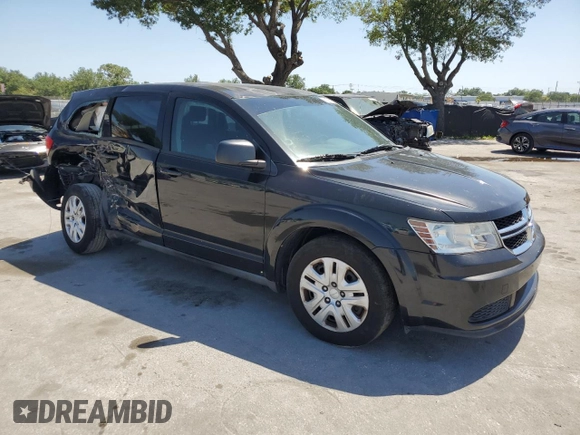 2013 Dodge Journey American Value with VIN 3C4PDCAB6DT709996, listed as a Copart auction lot 52362635 with 104,808 mi miles and Salvage Title. Bid and sale history available at DreamBid. Image 4.