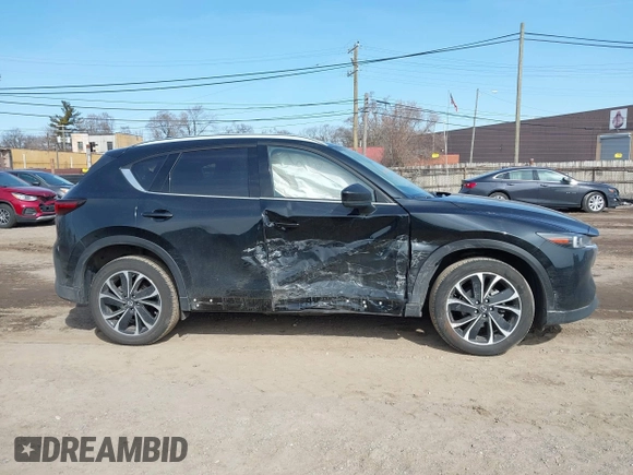 2023 Mazda CX-5 S Premium with VIN JM3KFBDM7P0201038, listed as a IAAI auction lot 41772989 with 26,227 mi miles and . Bid and sale history available at DreamBid. Image 13.