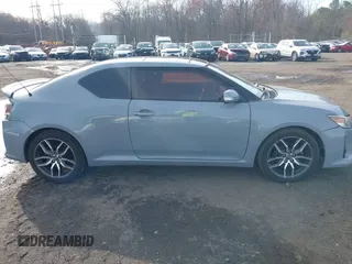 2014 Scion tC z VIN JTKJF5C71E3081033, wystawiony jako IAAI lot #41928949 z przebiegiem 144 112 mil mil oraz . Historia ofert i sprzedaży dostępna na DreamBid. Obrazek 13.