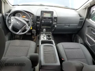 2015 Nissan Titan SV with VIN 1N6AA0EC9FN500624, listed as a Copart auction lot 50982985 with 128,976 mi miles and Salvage title. Bid and sale history available at DreamBid. Image 8.