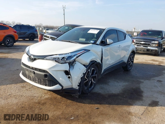 2021 Toyota C-HR LE with VIN JTNKHMBXXM1099019, listed as a IAAI auction lot 41525170 with 63,519 mi miles. Bid and sale history available at carsss.com. Image 17.
