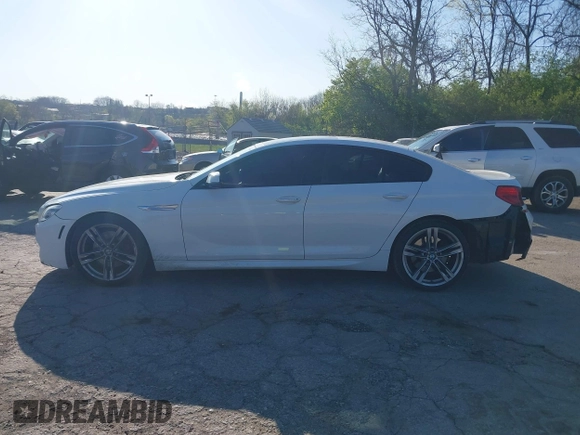 2016 BMW 6 Series 640i xDrive with VIN WBA6D2C51GGT66209, listed as a IAAI auction lot 42064405 with 113,500 mi miles and . Bid and sale history available at carsss.com. Image 15.