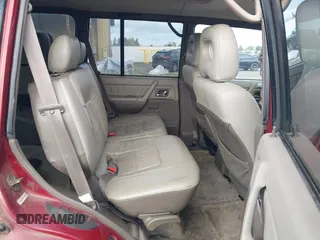 1998 Mitsubishi Montero z VIN JA4MR51RXWJ003468, wystawiony jako IAAI lot #41916695 z przebiegiem 214 694 mil mil oraz . Historia ofert i sprzedaży dostępna na DreamBid. Obrazek 8.