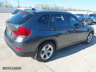 2014 BMW X1 sDrive28i with VIN WBAVM1C57EVW47767, listed as a IAAI auction lot 41867313 with 90,431 mi miles. Bid and sale history available at carsss.com. Image 4.