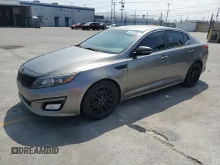 2015 Kia Optima LX z VIN 5XXGM4A75FG411813, wystawiony jako Copart lot #58424005 z przebiegiem 128 811 mil mil oraz Szkoda całkowita • Salvage title. Historia ofert i sprzedaży dostępna na DreamBid. Obrazek 1.