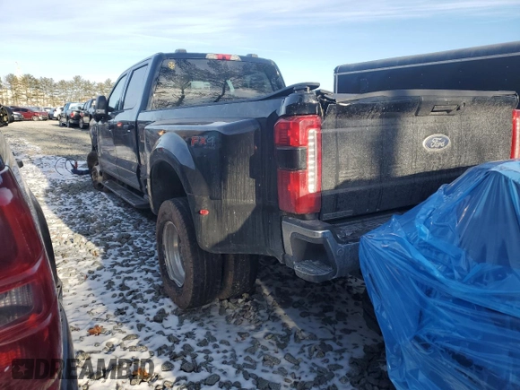 2023 Ford F-350 XL with VIN 1FT8W3DM2PED14021, listed as a Copart auction lot 87533355 with 86,991 mi miles and Salvage Title. Bid and sale history available at DreamBid. Image 2.
