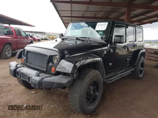 2008 Jeep Wrangler Unlimited Sahara with VIN 1J8GA59128L542384, listed as a IAAI auction lot 42184176 with 152,768 mi miles and . Bid and sale history available at DreamBid. Image 17.