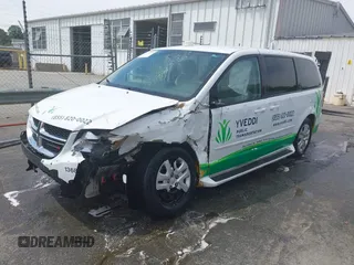 2014 Dodge Grand Caravan American Value with VIN 2C4RDGBG6ER380568, listed as a IAAI auction lot 41683180 with 303,612 mi miles and . Bid and sale history available at DreamBid. Image 2.