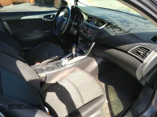2015 Nissan Sentra SV with VIN 3N1AB7AP6FY229027, listed as a IAAI auction lot 41724352 with 183,736 mi miles and . Bid and sale history available at DreamBid. Image 5.