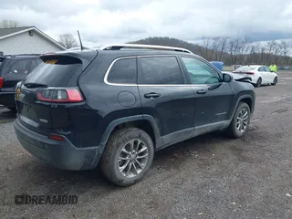 2019 Jeep Cherokee Latitude Plus with VIN 1C4PJMLB1KD237138, listed as a IAAI auction lot 41956339 with 81,180 mi miles. Bid and sale history available at carsss.com. Image 4.