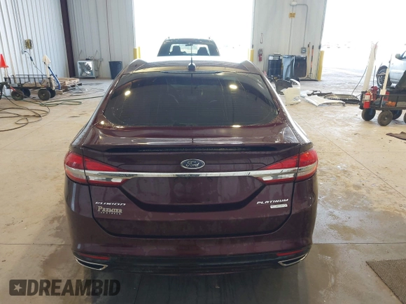 2017 Ford Fusion Titanium with VIN 3FA6P0K91HR171231, listed as a IAAI auction lot 41131312 with 115,265 mi miles. Bid and sale history available at carsss.com. Image 16.