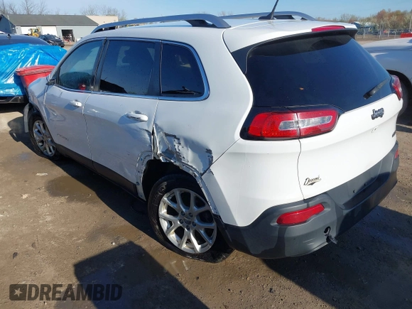 2015 Jeep Cherokee Latitude with VIN 1C4PJLCBXFW506502, listed as a IAAI auction lot 42103117 with 160,433 mi miles and . Bid and sale history available at carsss.com. Image 3.