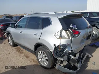 2019 Nissan Rogue SV with VIN KNMAT2MT0KP527901, listed as a IAAI auction lot 42260779 with 102,975 mi miles and . Bid and sale history available at DreamBid. Image 3.