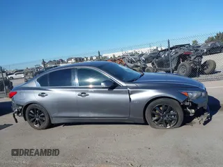 2017 Infiniti Q50 Premium with VIN JN1EV7AP3HM742461, listed as a IAAI auction lot 41307826 with 82,486 mi miles and . Bid and sale history available at DreamBid. Image 13.