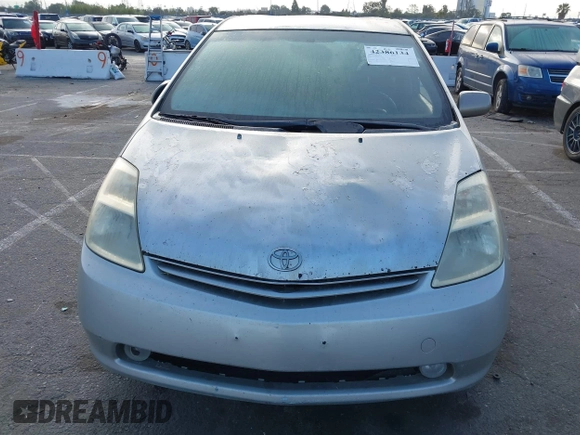 2005 Toyota Prius z VIN JTDKB20U353071619, wystawiony jako IAAI lot #42386134 z przebiegiem Nie podano mil oraz . Historia ofert i sprzedaży dostępna na DreamBid. Obrazek 6.