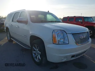 2012 GMC Yukon XL Denali with VIN 1GKS1MEF6CR138320, listed as a IAAI auction lot 42123524 with 184,182 mi miles. Bid and sale history available at carsss.com. Image 1.