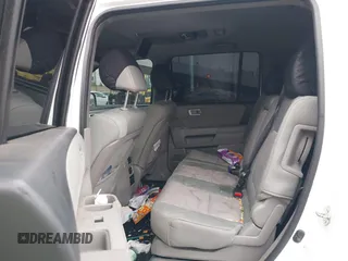 2015 Honda Pilot SE z VIN 5FNYF3H31FB005140, wystawiony jako IAAI lot #42081541 z przebiegiem 182 557 mil mil oraz . Historia ofert i sprzedaży dostępna na DreamBid. Obrazek 8.