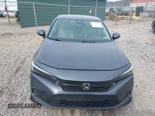 2022 Honda Civic Sedan Touring with VIN 2HGFE1F9XNH316999, listed as a IAAI auction lot 41994799 with 39,675 mi miles. Bid and sale history available at carsss.com. Image 12.
