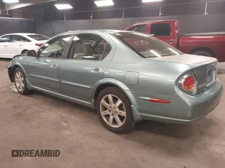2002 Nissan Maxima GLE z VIN JN1DA31A12T308581, wystawiony jako IAAI lot #41742949 z przebiegiem 116 892 mil mil oraz . Historia ofert i sprzedaży dostępna na DreamBid. Obrazek 3.